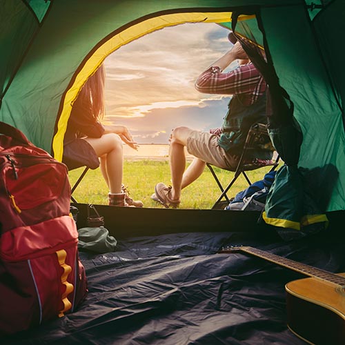 Couple lifestyle travel camping together in forest, Happy and re